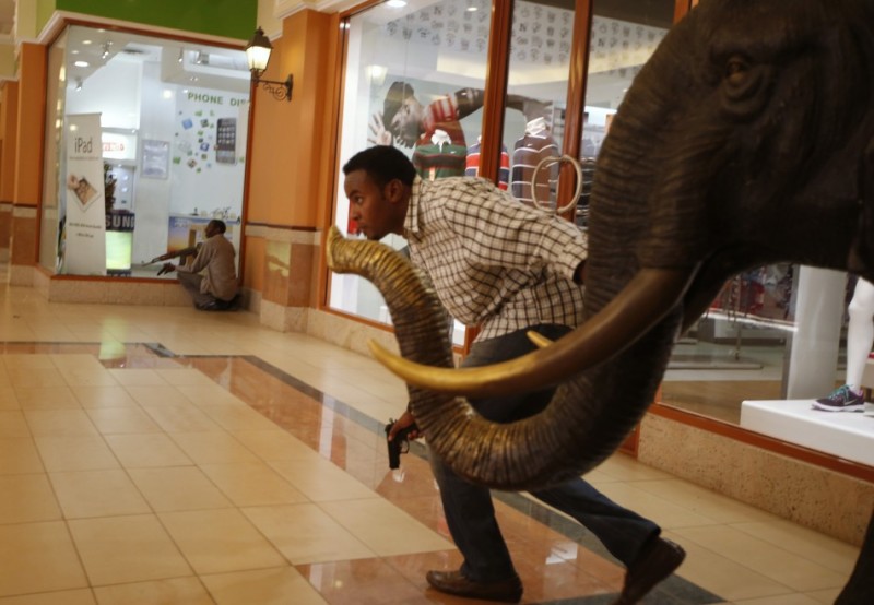 Armed police search through Westgate shopping centre for gunmen in Nairobi, September 21, 2013. 