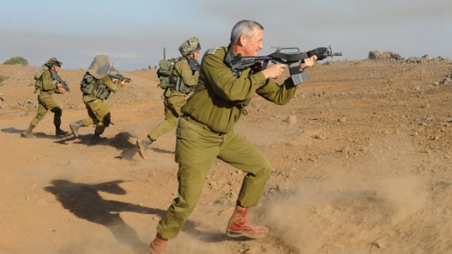 Chief of Staff Lt. Gen. Benny Gantz in action during a live fire exercise for battalion commanders on the Golan Heights, September 4, 2012. (photo credit: Shay Wagner/IDF/Flash90)